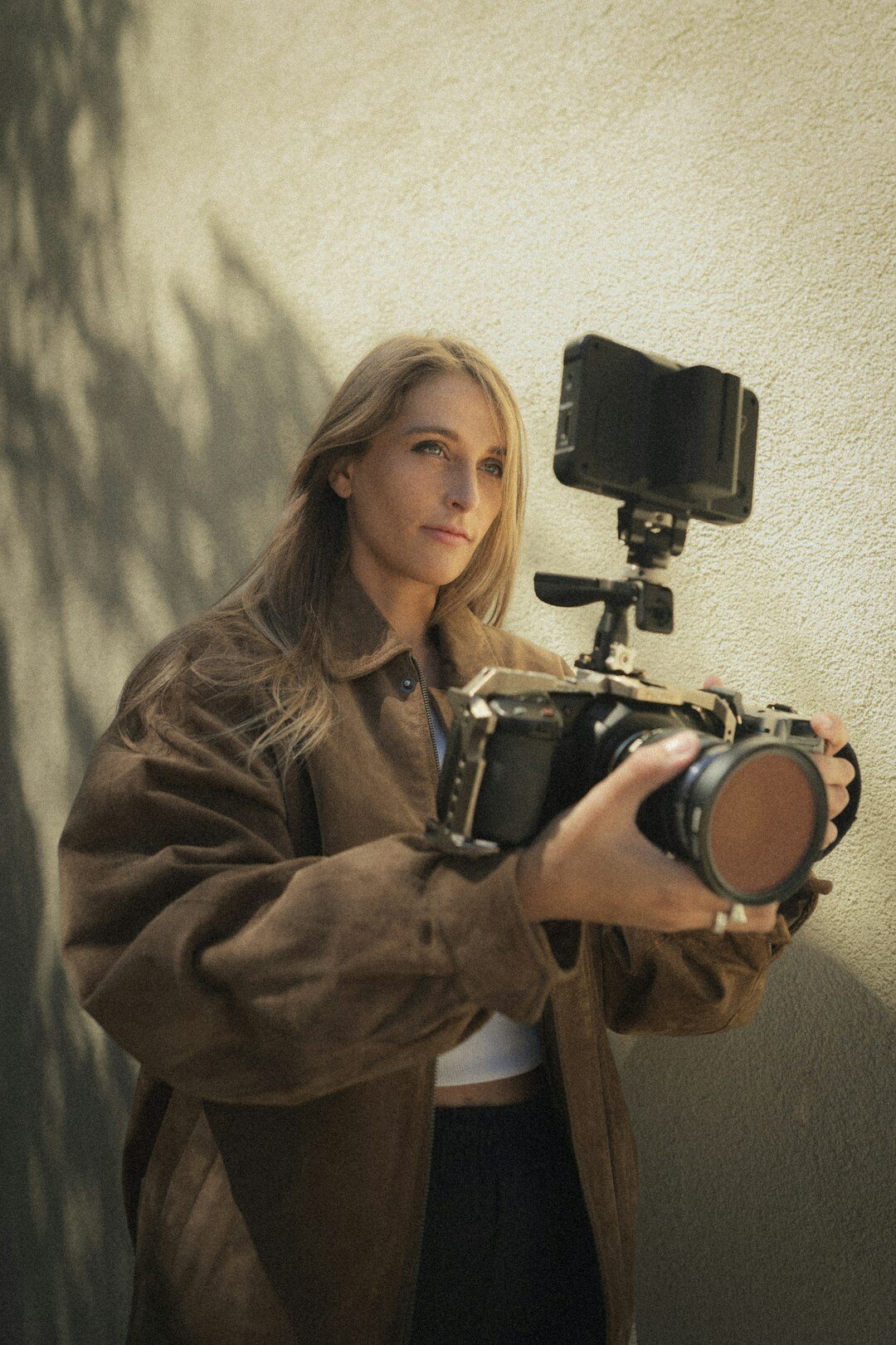Portrait of the editor-in-chief, a Danish woman holding a camera