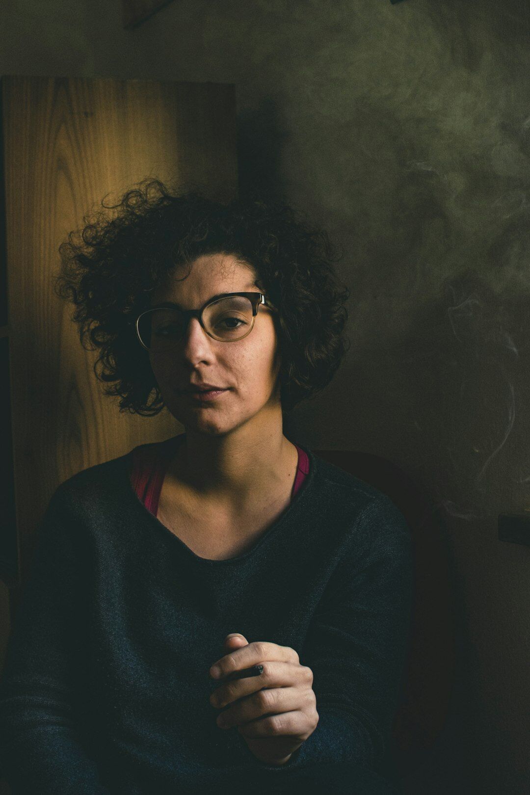Portrait of a Danish female writer holding a notebook