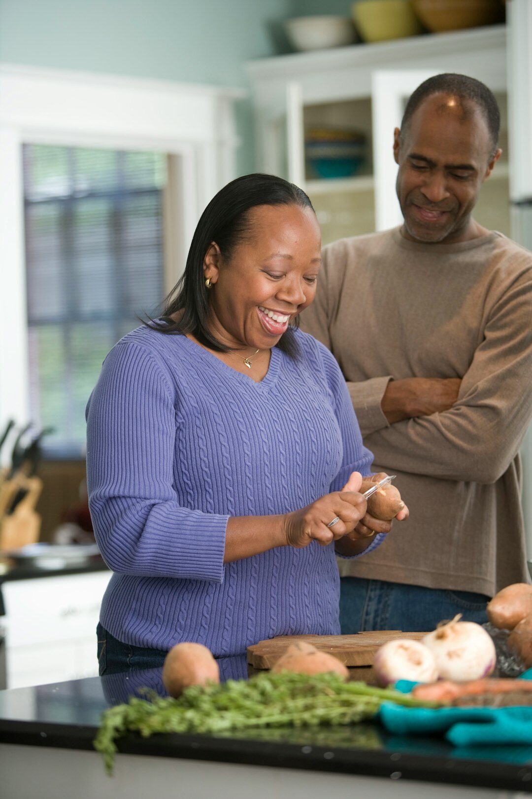 elderly people cooking together