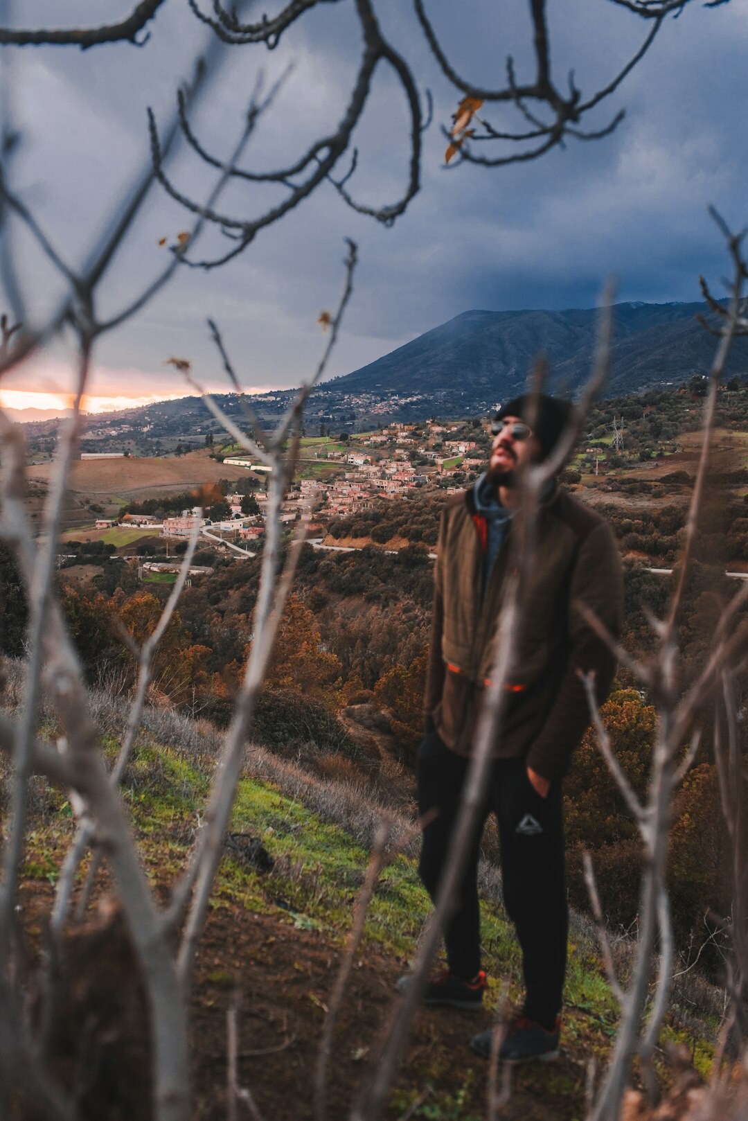 photographer with camera in village